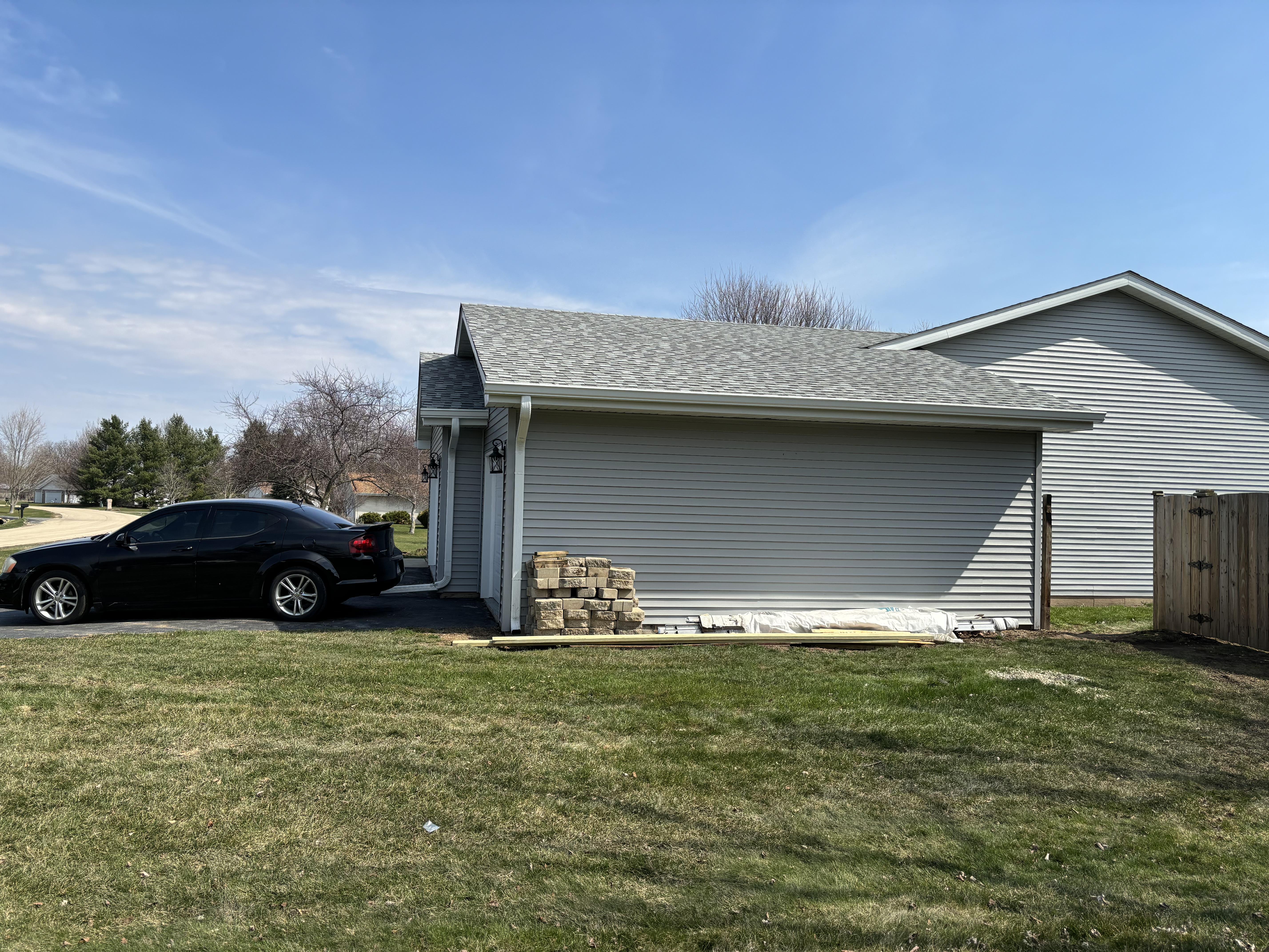Seamless Aluminum Gutter Installation on Two-Story Home Completed seamless aluminum gutter installation on a two-story home